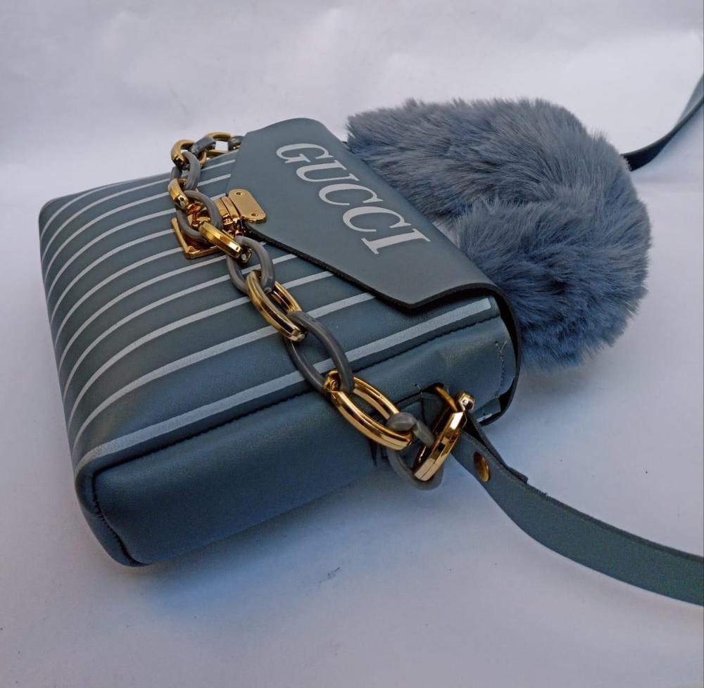 Womans rexine printed top handle shoulder bag